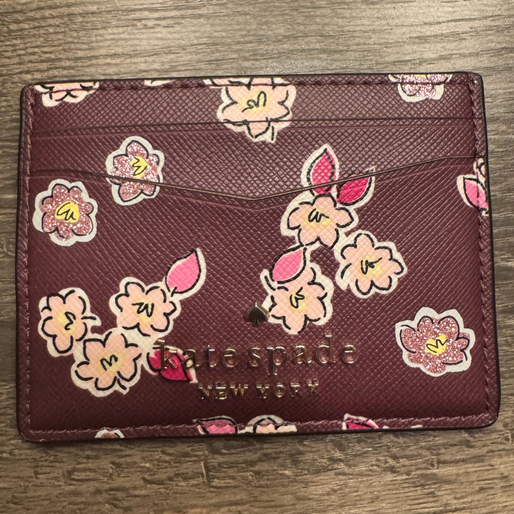 Kate Spade Floral leath card holder.